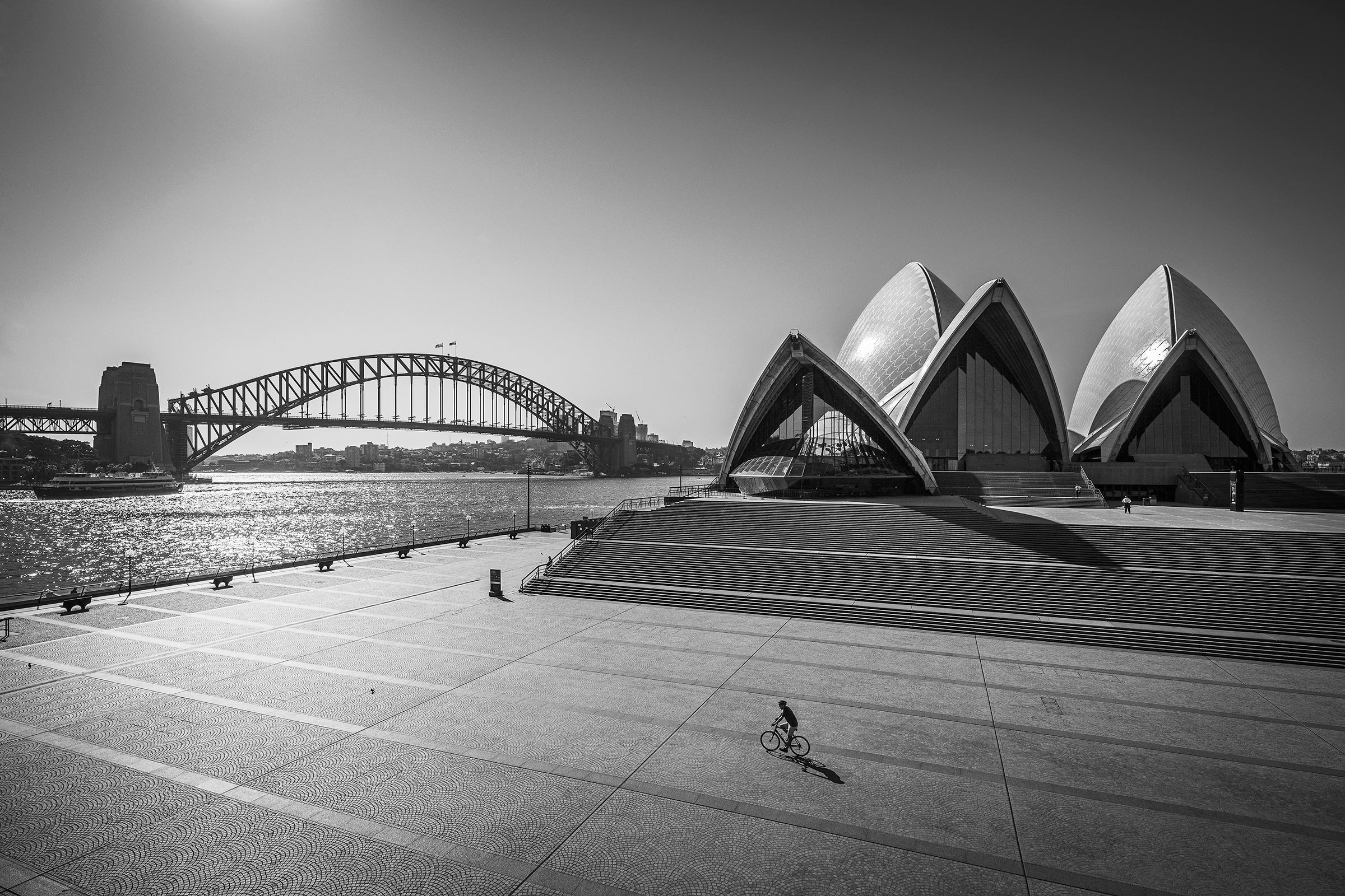 Landscape Sydney photography of empty forecourt of Sydney opera house with harbour bridge in background